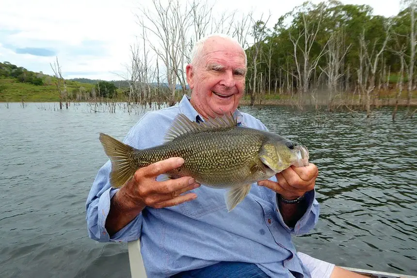 GREAT CATCH: Ray Kennedy with a fish caught from Lake Hinze.
