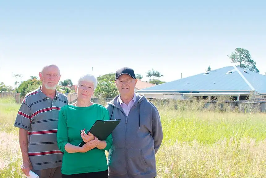 STANDING THEIR GROUND: John Watts with neighbours Rhonda and David Lamont