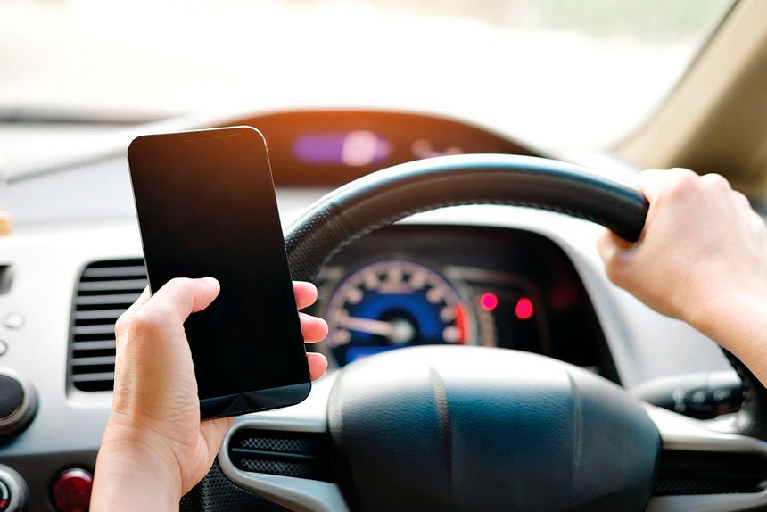 DON’T DO IT: Checking the phone when a message comes through is a habit young drivers must drop. Even a $1000 plus fine isn’t stopping them.