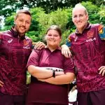 LEADING THE WAY: Broncos representatives Scott Prince and Ali Brigginshaw with Cleveland District State High School student Anika Anderson (centre).