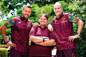 LEADING THE WAY: Broncos representatives Scott Prince and Ali Brigginshaw with Cleveland District State High School student Anika Anderson (centre).