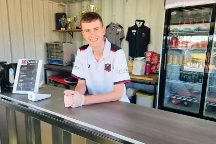 NEW DIGS: Under 14 player Nicolas Monck works the canteen at Redland City FC.