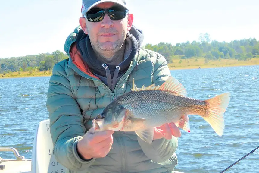 SUCCESSFUL OUTING: Mark Masters with a bass caught at North Pine Dam.