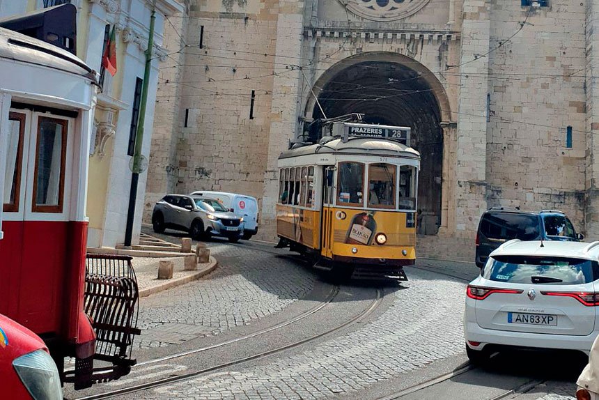 TRAM RIDE: Taking a trip on the vintage trams is a favourite with tourists in Lisbon.