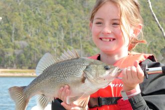 FISHING TRIP: Amelia Harris caught a 42cm bass at Lake Hinze.
