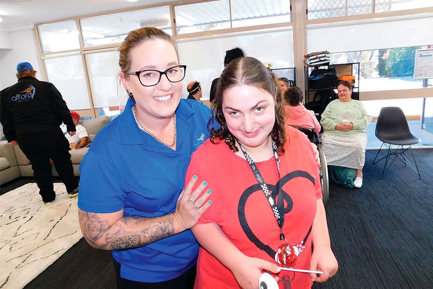 HELPING LOCALS: Afford staff member Tania with Emily Draper of Birkdale at the opening of Afford’s Redland hub.