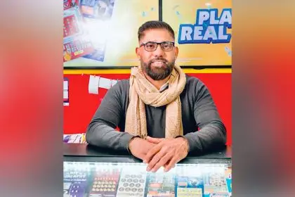 BIG WIN: News Extra Birkdale manager Adrian Johal is revelling in the success of his customers.