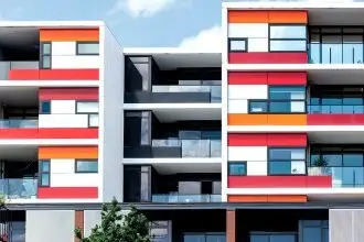 BOUNCING BACK: An almost 60 per cent uptick in new apartment buildings has boosted the housing industry. Photo: AAP Image/Diego Fedele