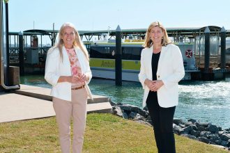 COMMUNTY BOOST: Health Minister Shannon Fentiman and Redlands MP Kim Richards with the new ambulance vessel at Redland Bay.