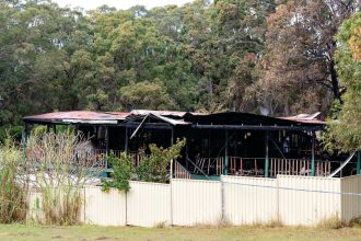 DEVASTATION: The scene of a fatal house fire on Russell Island, where police are carrying out an investigation. Photo: Russell Freeman/AAP Images