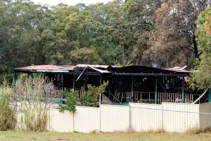 DEVASTATION: The scene of a fatal house fire on Russell Island, where police are carrying out an investigation. Photo: Russell Freeman/AAP Images