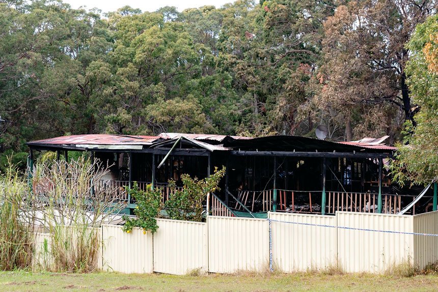 DEVASTATION: The scene of a fatal house fire on Russell Island, where police are carrying out an investigation. Photo: Russell Freeman/AAP Images