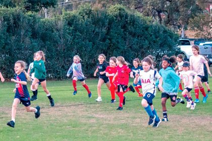 FOOTBALL FUN: Twenty-seven girls enjoyed their introduction to the beautiful game at the first of Redlands United’s free girls come and try sessions. Photo: Ray Gardner