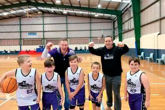 FUNDING BOOST: Capalaba Wildcats at the Redlands PCYC with Capalaba MP Don Brown (back right).
