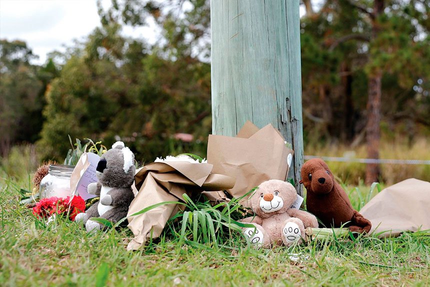 MOURNING: Tributes have been left near the site of Sunday’s fatal fire. Photo: Russell Freeman/AAP Image