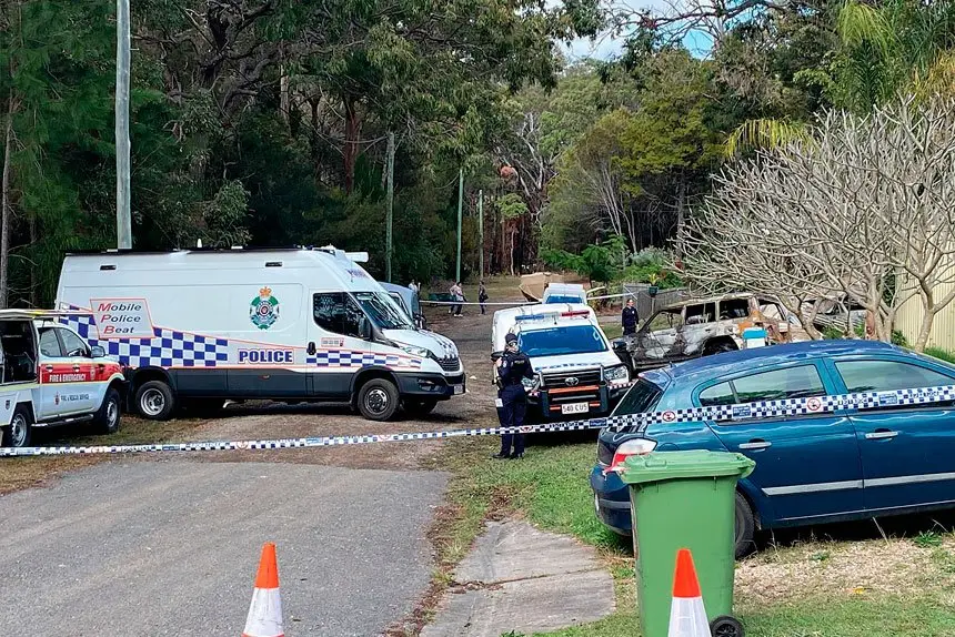 ON SCENE: Police have cordoned off homes as they continue their investigations on Russell Island. 