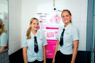 SUPPORT: Victoria Point State High School students with a Dignity Vending Machine installed on campus.