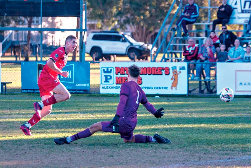 TALLISMAN: Peter Klaassen opened the scoring for the Red Devils as Redlands United overcame Brisbane Roar 3-0.