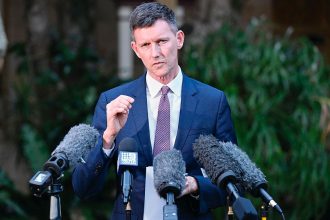 RAIL PLAN: Transport Minister Mark Bailey is facing questions over the state government’s management of the Cleveland rail line. Photo: Darren England/AAP Photos