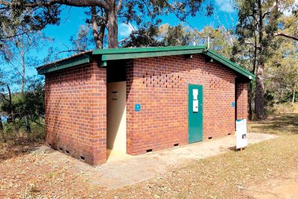 BOGGED DOWN: Macleay Island resident Gray Mewburn says this public toilet block on Waterside Drive should remain open.