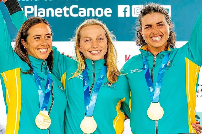 CHAMPIONS: Noemie Fox, Kate Eckhardt and Jessica Fox with their gold medals at the 2023 ICF Canoe Slalom World Championships.