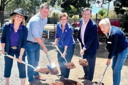 Turning the first sod for the new U3A building at Cleveland are Cr Wendy Boglary, Bowman MP Henry Pike, U3A president Janese Lowe, Oodgeroo MP Mark Robinson and past president Julie Porteus.