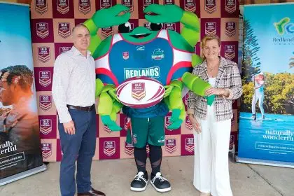 Queensland Touch Football CEO Greg Denny and Mayor Karen Williams with Redlands Touch Association mascot CLAW-dia.