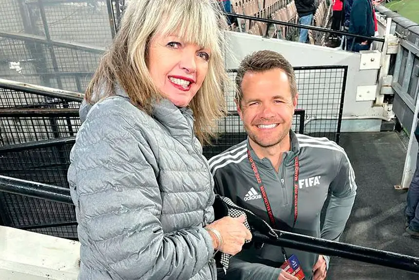 Chris Beath with his late mum before he officiated the Manchester United and Melbourne Victory match. 