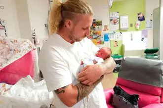 Alexandra Hills dad Jake Groom with daughter Imelda.