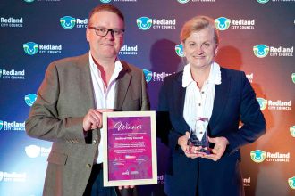 RECOGNITION: Redland City Council chief executive Andrew Chesterman and mayor Karen Williams with the LGAQ Alison Woolla Award.