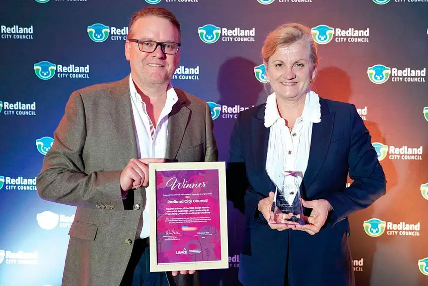RECOGNITION: Redland City Council chief executive Andrew Chesterman and mayor Karen Williams with the LGAQ Alison Woolla Award.