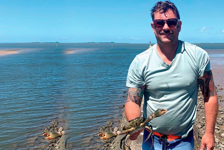 Tim Simmonds with a slightly undersize, male, mud crab he caught and released at Wynnum this week
