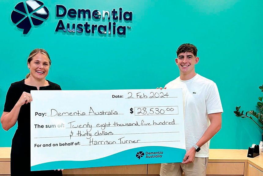 Harrison Turner donates $28,530 to Dementia Australia following a marathon fundraising run.