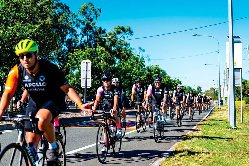 FUNDRAISER: Businessmen get on their bikes to raise funds for youth workshops.