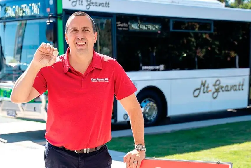 Member for Capalaba Don Brown celebrates the new 50 cent fares. PHOTO: Capalaba Electorate Office