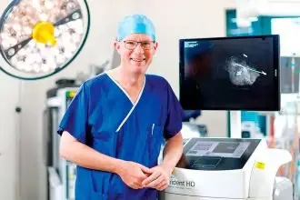 Mater Private Hospital Redland breast and endocrine surgeon Jason Lambley with the Faxitron Trident HD.