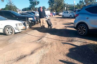 Aside from unwanted tickets, potholes are proving problematic in the carpark.