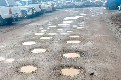 BUMPY RIDE: The carpark is dotted with potholes but Council says it has a plan to fix them.