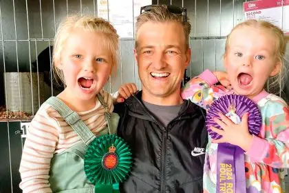 Rose, Nick and Pia Turnbull celebrate their success in the poultry section at this year’s Ekka.