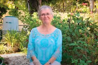 Jill Nixon is most at home in her own backyard where every spare space is planted with produce.