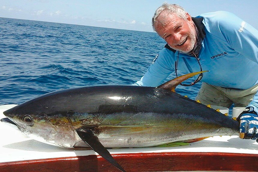 Norm Haupt with a yellow fin tuna caught when fishing in Panama.