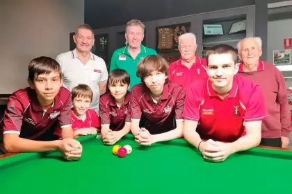 Front row, from left: Kenneth Hinton, Lachlan Dinga, Haru Huber, Kenta Huber, and Jayden Dinga. Back row, from left: Jason Colebrook, Peter Gilchrist, and Redlands RSL Snooker & Billiards Club life members Bob Turpin and John Balderson.