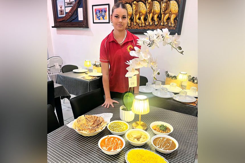 Waitress Tania Overson from the Punjabi Sunrise in Alexandra Hills.