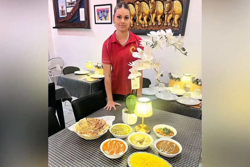 Waitress Tania Overson from the Punjabi Sunrise in Alexandra Hills.