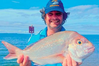 Allan Dryden with a snapper caught at Wynnum.