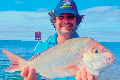 Allan Dryden with a snapper caught at Wynnum.