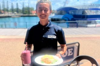Sam Bush with the popular Eggs Benedict and a delicious smoothie.