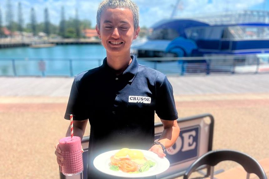 Sam Bush with the popular Eggs Benedict and a delicious smoothie.
