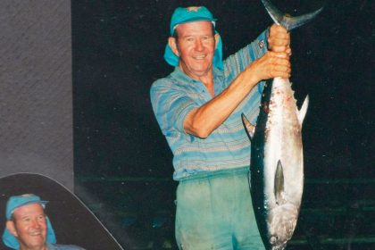 Bill Jenkins in his younger days with a blue fin tuna caught on Turtle Head Island.