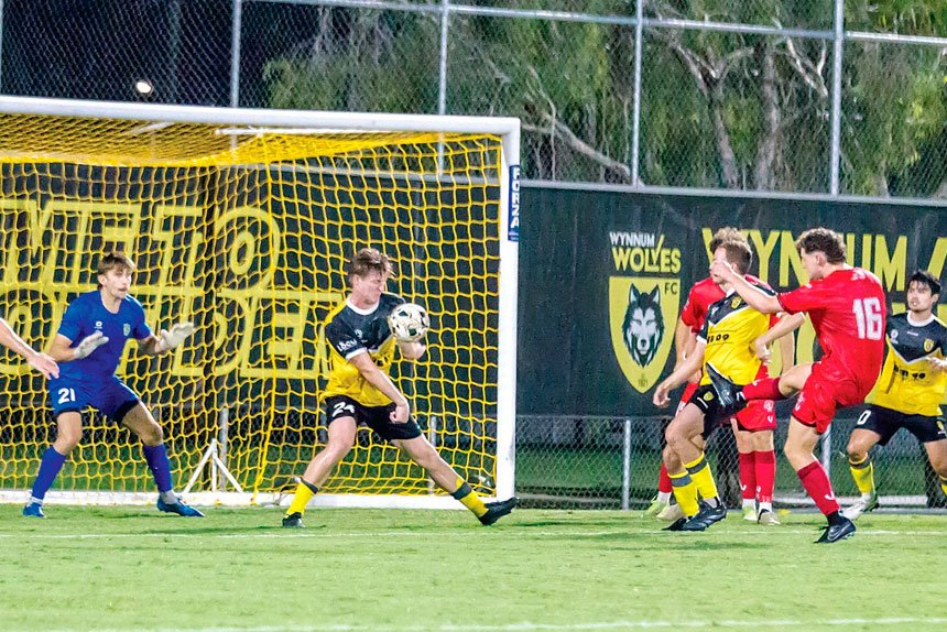 This shot from Redlands’ Josh Masters is blocked on the line by Wynnum Wolves captain Jacob Krayem. Photo: Ray Gardner